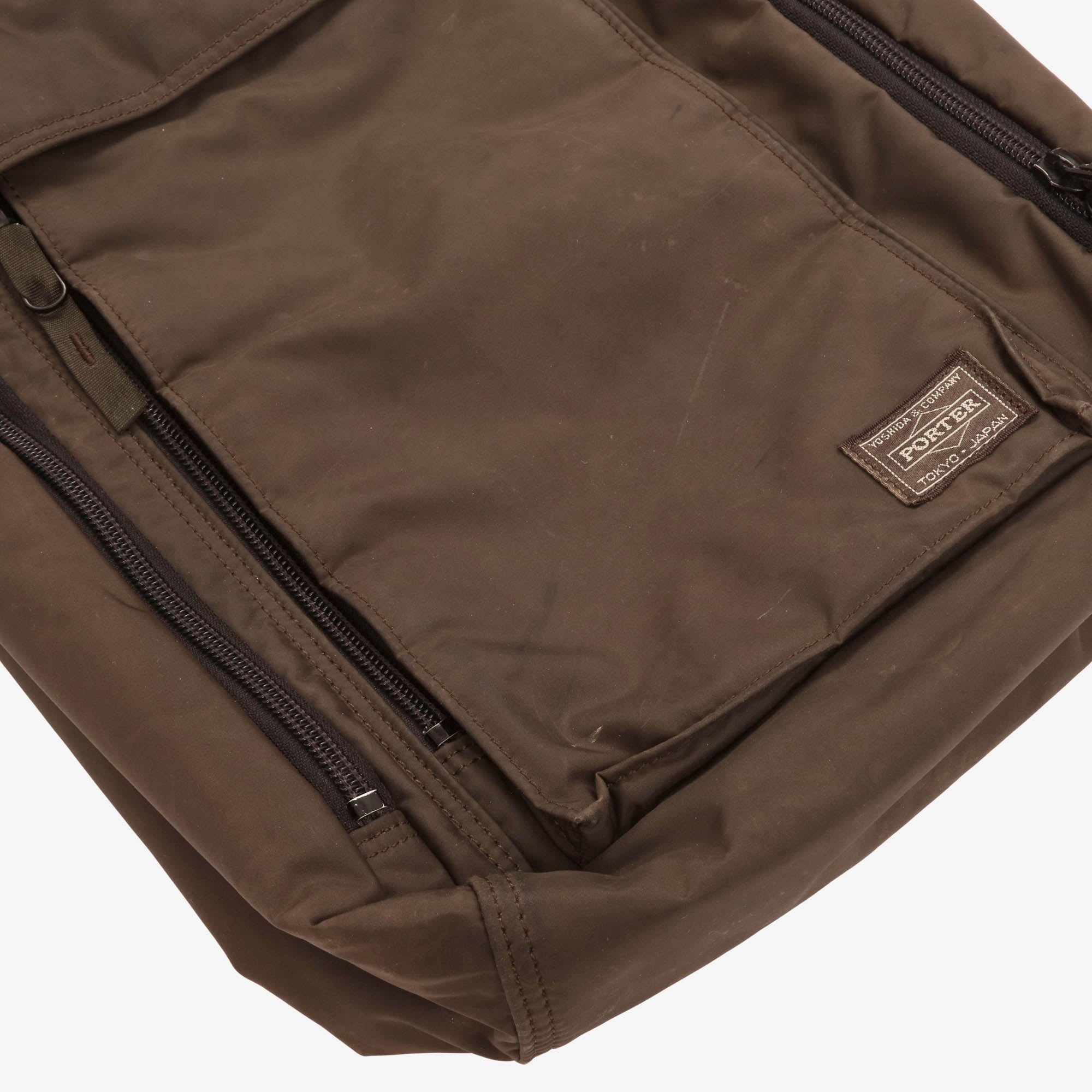 Brownie Vertical Sling Bag